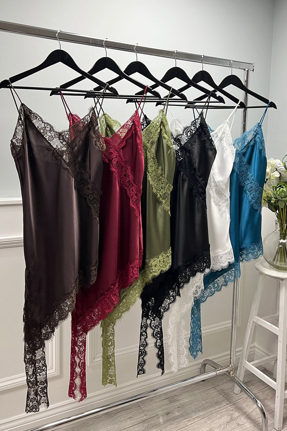 V-neck , asymmetrical, satin camisole with delicate spaghetti straps