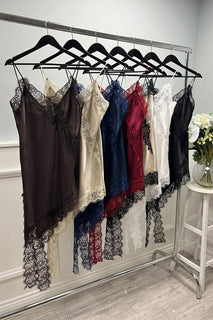 V-neck , asymmetrical, satin camisole with delicate spaghetti straps