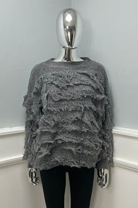 round neck ,oversized knit jumper fringed effect across the front, sleeves, and back