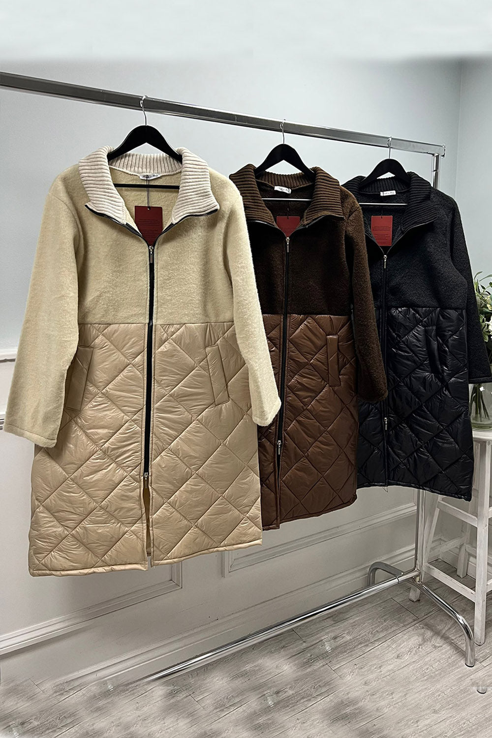 Two-tone quilted coat — chocolate blend perfection with a modern zip-front finish.