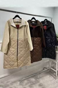 Two-tone quilted coat — chocolate blend perfection with a modern zip-front finish.