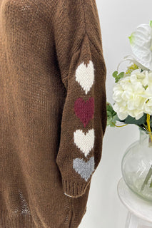 Relaxed fit knitted jumper with heart-patterned sleeves