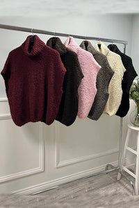 Turtleneck Jumper - Soft boucle knit with a relaxed cut and rolled turtleneck