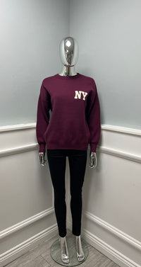Crewneck sweater — sporty and minimal with ribbed trims