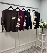 Crewneck sweater — sporty and minimal with ribbed trims