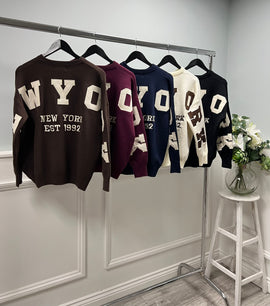Crewneck sweater — sporty and minimal with ribbed trims