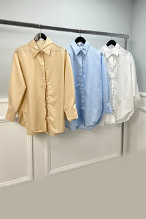 oversized shirt with structured collar and concealed button placket