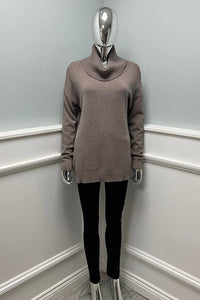 Relaxed fit , wide ribbed high neck jumper with Button detail