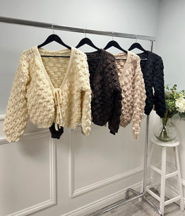 Cable-knit cardigan with tie-front detail and balloon sleeves