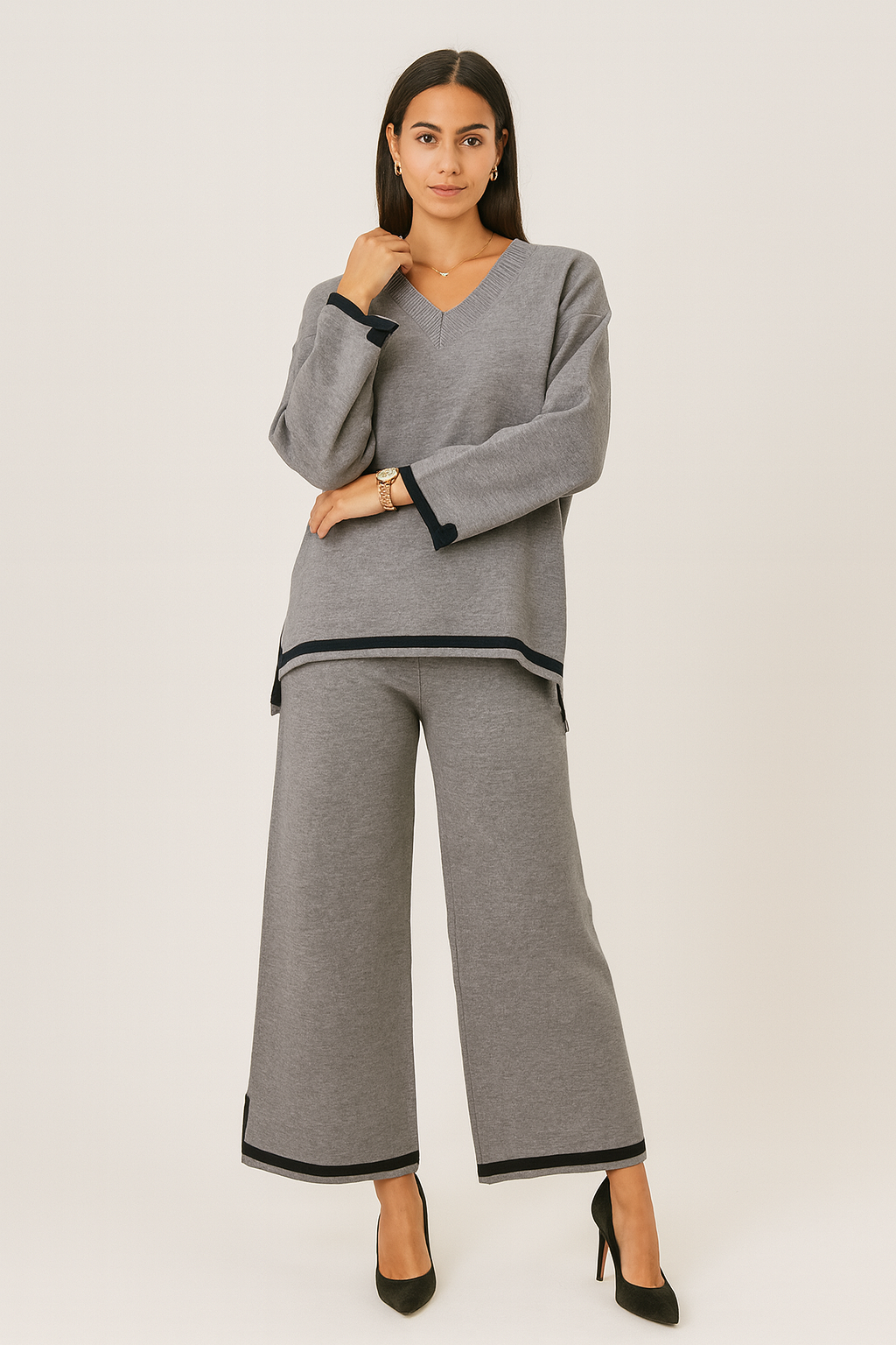 V-neck, long-sleeved Co Ords with striped detailing at the hem and cuffs.