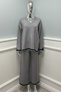 V-neck, long-sleeved Co Ords with striped detailing at the hem and cuffs.