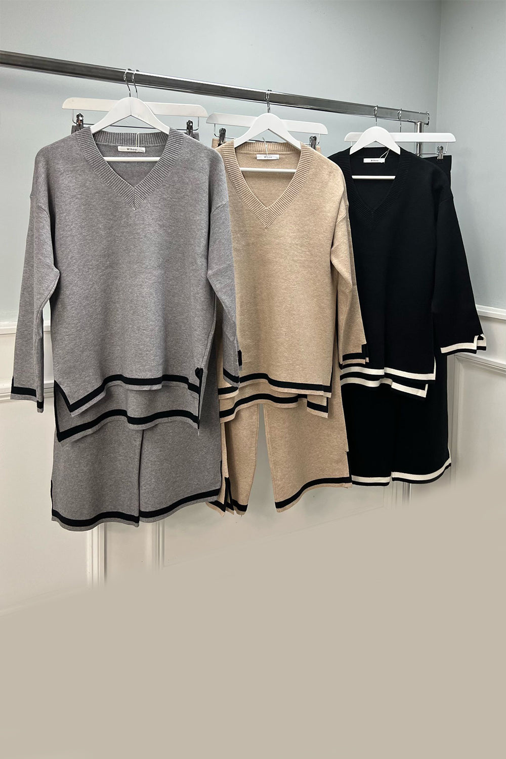 V-neck, long-sleeved Co Ords with striped detailing at the hem and cuffs.