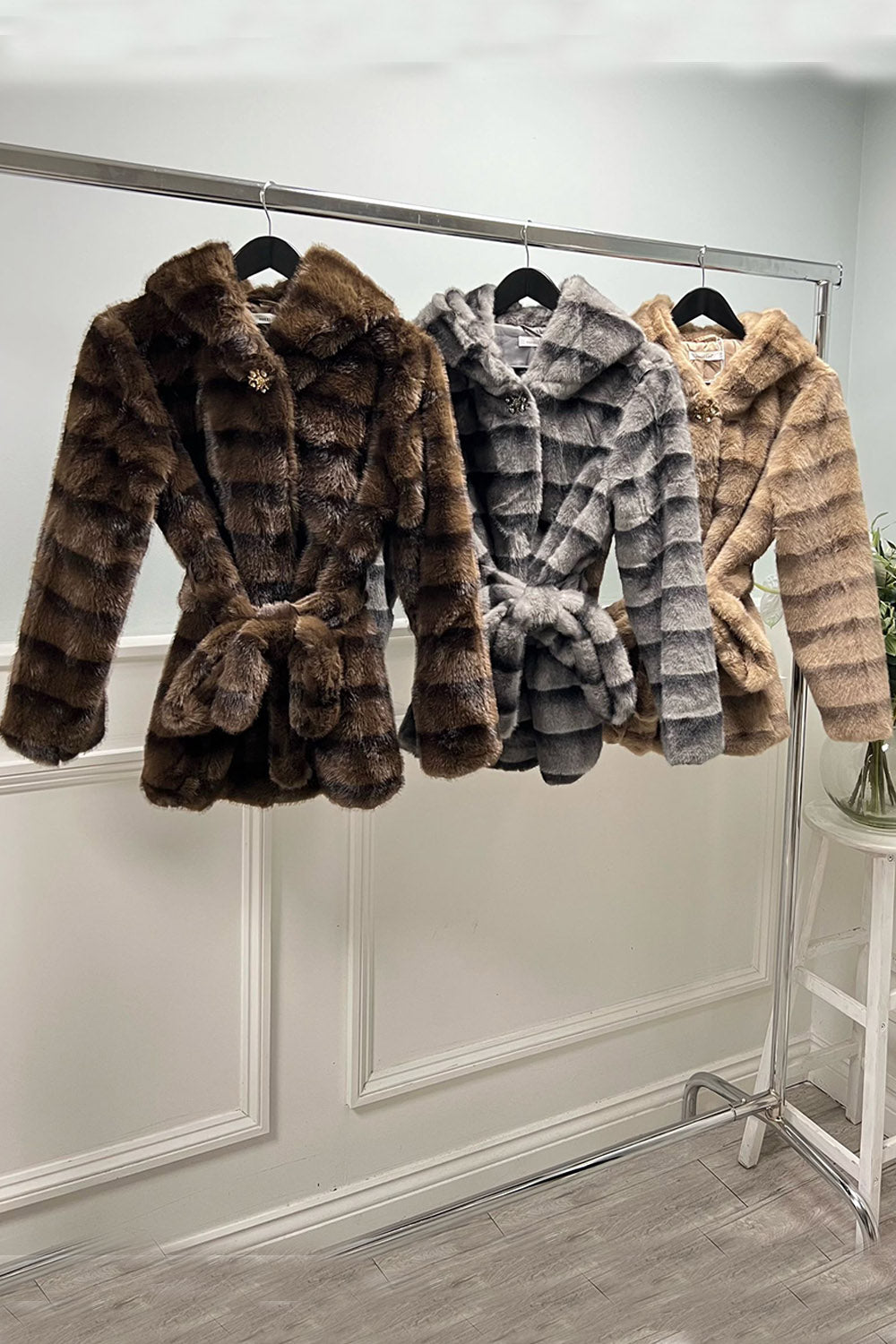 Striped faux fur coat — plush texture, waist-tie finish