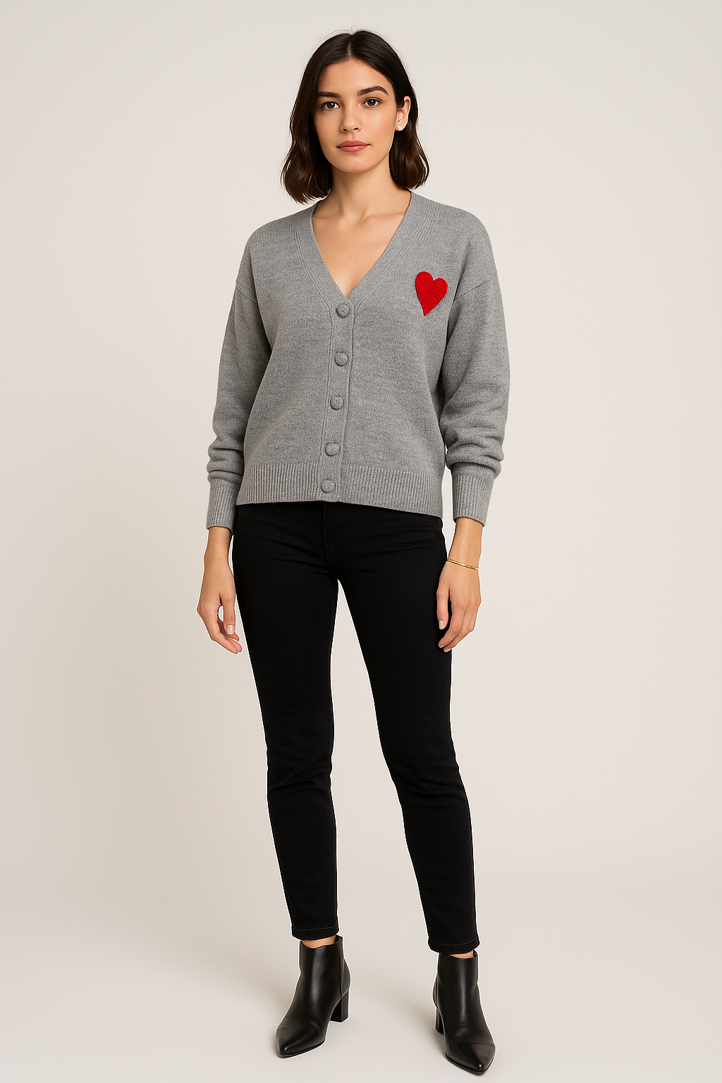 V-neck and button-down front cardigan with a red heart patch
