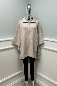Oversized , soft woollen textured , wide sleeves jumper with half-zip collar