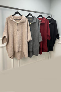 oversized , soft woollen textured , wide sleeves jumper with half-zip collar