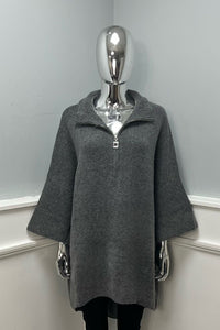oversized , soft woollen textured , wide sleeves jumper with half-zip collar