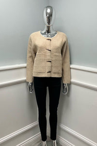 Structured short Cardigan with a round neckline, front toggle closures, and clean patch pockets