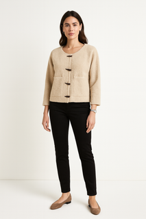 Structured short Cardigan with a round neckline, front toggle closures, and clean patch pockets