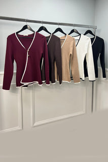 Cardigans with a sleek black trim & gold button accents