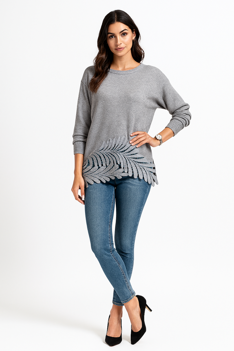 a relaxed fit jumper with a unique laser-cut leaf pattern along the hem