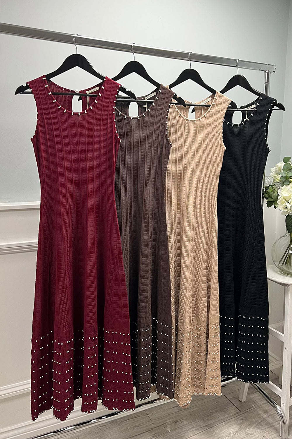 nude ribbed knit midi dress with pearl-embellished hem