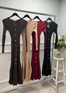 Ribbed knit dress with a sleek button-down front, fitted long sleeves, and a gently flared hem
