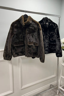 Velvety textured faux fur jacket with high stand collar & large, flap-style front pockets