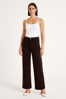Contemporary chic — high-waist brown wide-leg jeans with side stud detailing