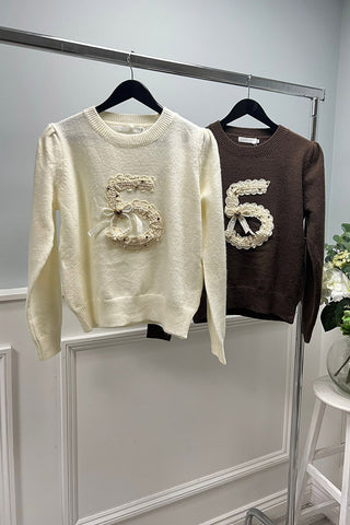 Chocolate knit sweater with embroidered “5”